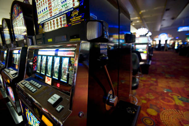 Mobile slot game interface showing symbol grid and play button